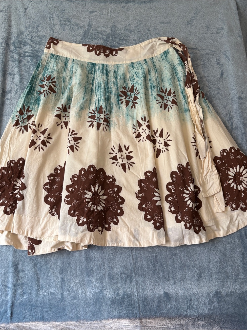 Odille Cream Midi Skirt with Teal Accents and Brown Medallions